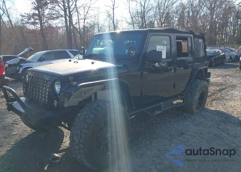 2014 Jeep Wrangler Unlimited Rubicon z USA, uszkodzony, nr VIN 1C4HJWFG2EL157963